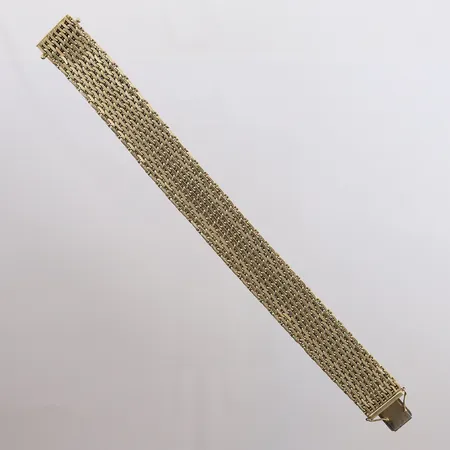 Armbånd, lengde 20cm, bredde 18,7mm, slitt lås (sikkerhetslås fungerer), 14K Vekt: 67,5 g Kontakt Lånekontoret for frakt