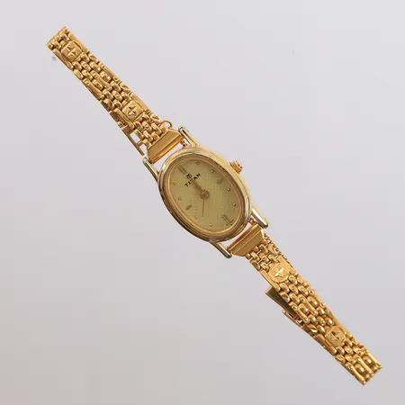 Armbåndsur, Titan India, ref. 2061YAB, 24x18mm, gul urskive, quartz, behøver batteribytte, urkasse er gulmetall (ikke gull), lenke er 22K gull, bruttovekt 27,6g Kontakt Lånekontoret for frakt