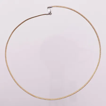 Halskjede to-farget, lengde 40,5 mm, bredde 1,9 mm, 18K Vekt: 7,8 g Kontakt Lånekontoret for frakt
