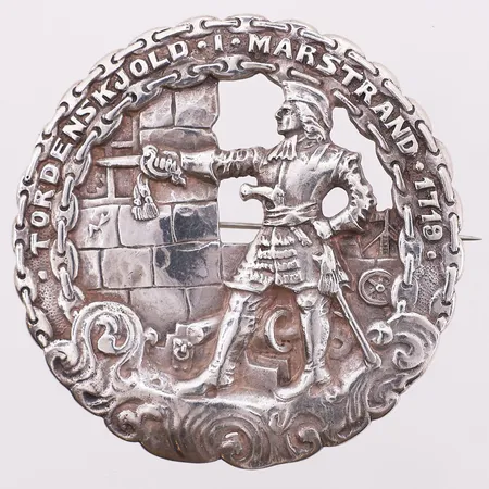 Brosje, "Tordenskjold i Marstrand 1719", Ø 64,8 mm, bredde 9,9 mm, 830S Vekt: 40,4 g Kontakt Lånekontoret for frakt