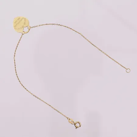 Armånd med anheng, "Please return to tiffany & co New York", lengde 19 cm, bredde 1mm, 18K Vekt: 1,9 g Kontakt Lånekontoret for frakt