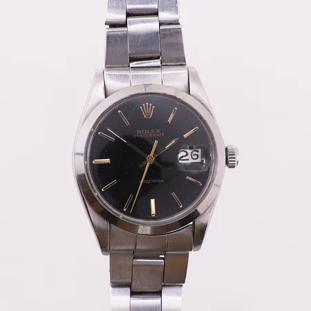 Herrur Rolex Oysterdate Precision, 35 mm, stål, manuell, serienr 1864015, Cal:1225, boettnr: 6694, dato, små riper på pleksiglass, oysterlenke, ref: 6694, riper på boett og lenke, ingen øvrig tilbehør Kontakt Lånekontoret for frakt