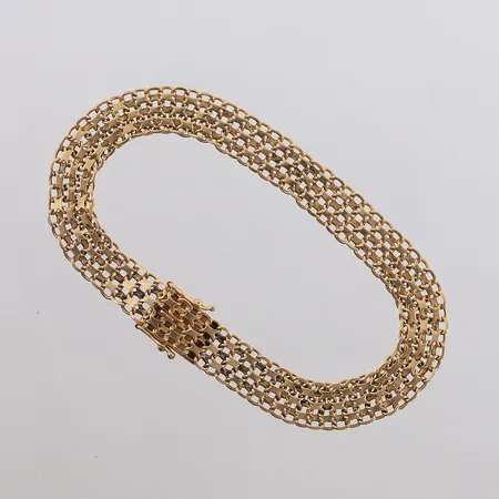 Armbånd X-lenke, lengde 19cm, bredde 8,1mm, noe ujevnt mønster, 18K Vekt: 12 g Kontakt Lånekontoret for frakt