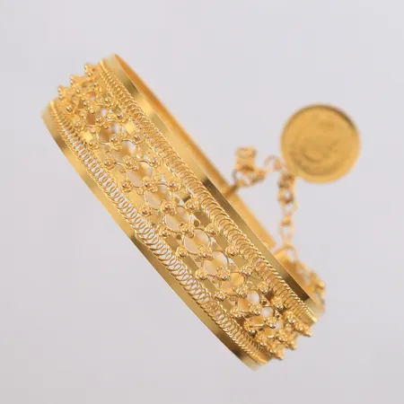 Armring med mynt, kan åpnes, ø62mm, bredde 17,5mm, 18K (mynten er 22K), bruttovekt 26,4g Vekt: 0 g Kontakt Lånekontoret for frakt