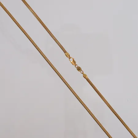 Kjede, lengde 56cm, bredde 2,5mm, 22K Vekt: 20,7 g Kontakt Lånekontoret for frakt