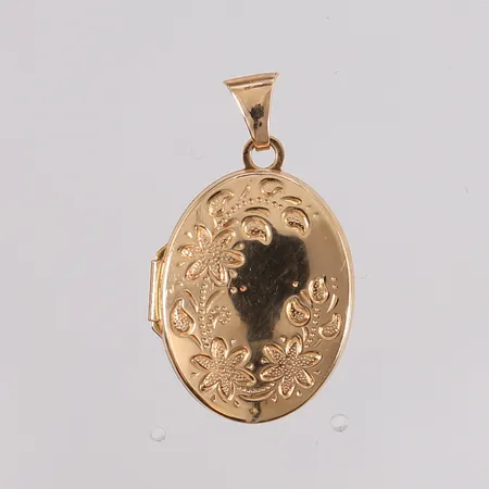 Medaljong med sort innside, 28x17mm, 14K, bruttovekt 8g Vekt: 0 g Kontakt Lånekontoret for frakt