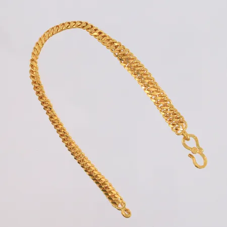 Armbånd, lengde 21cm, bredde 7,3mm, noe ujevnt mønster, 22K Vekt: 39,9 g Kontakt Lånekontoret for frakt