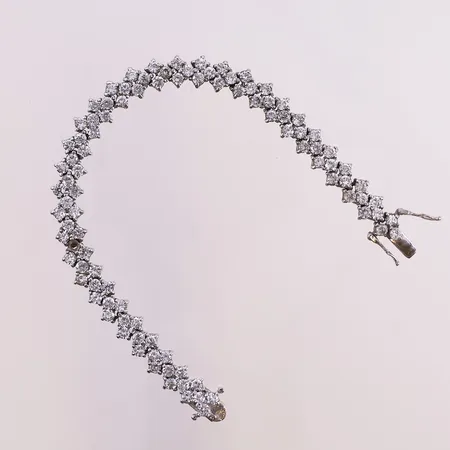 Armbånd med klare stener, lengde 18 cm, bredde 8,4 mm, mangler én sten, 925S Vekt: 19,6 g Kontakt Lånekontoret for frakt