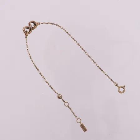 Armbånd med anheng, lengde ca. 19,5 cm, bredde 1,45 mm, 18K Vekt: 3,3 g Kontakt Lånekontoret for frakt