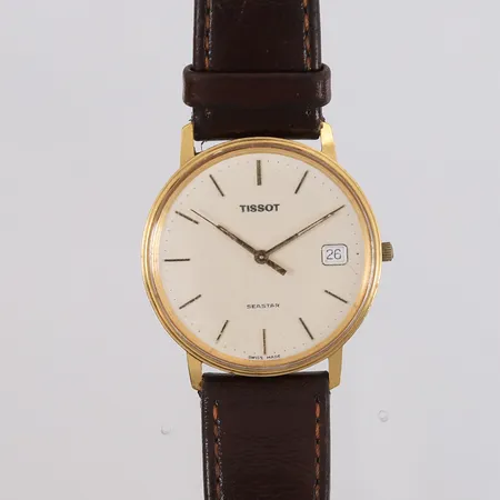 Armbåndsur i gull med lærrem, Tissot, går ikke, gravert baklokk, 18K Kontakt Lånekontoret for frakt