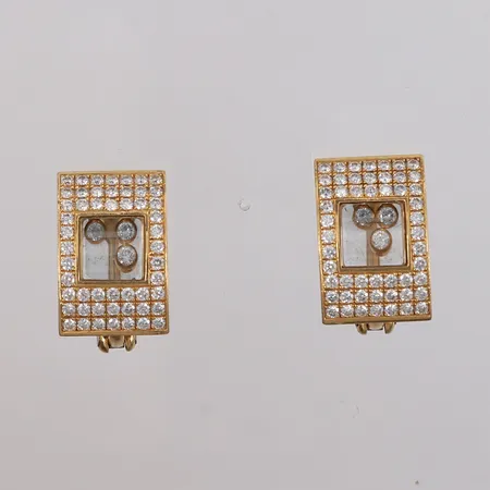 Ett par øredobber med 2x55 diamanter (totalt ca. 1,00ct), trolig Chopard (snr: 9402818, 84/3180), 13x20mm, 18K, uten sertifikat eller ekthetsbevis Vekt: 23,4 g Kontakt Lånekontoret for frakt