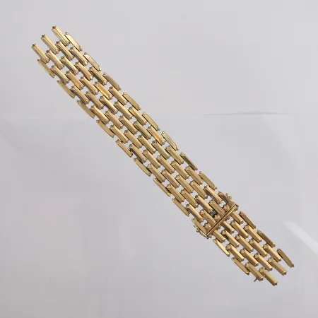 Armbånd (røket), lengde 19,5cm, bredde 23mm, 14K Vekt: 54,5 g Kontakt Lånekontoret for frakt
