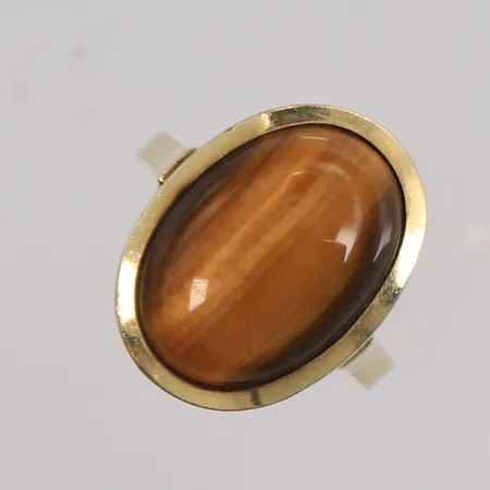Ring med Tigerøye, ø18,3mm, bredde 2,2- 19,8mm, 14K, bruttovekt 5,2g Vekt: 0 g Kontakt Lånekontoret for frakt