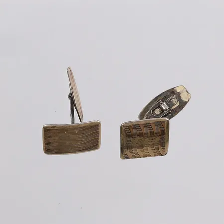 Ett par mansjettknapper, forgylte, 18x15mm, 830S Vekt: 7,3 g Kontakt Lånekontoret for frakt