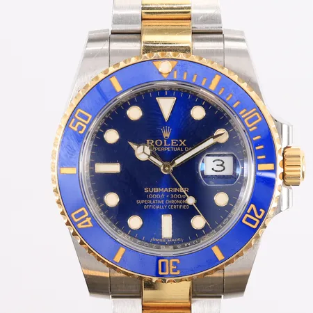 Armbåndsur Rolex Submariner, ref 116613LB, snr UM340702, boettnr 2360, cal 3135, urverksnr 453318N7, stål/gull, ø40mm, automat, dato, små riper på klokke og lenke, sertifikat Bjerke år 2017, 3 ekstra lenkebiter, tags og boks.  Kontakt Lånekontoret for frakt