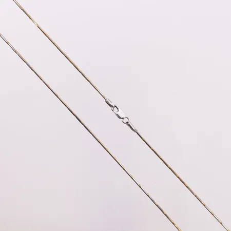 Halskjede to-farget, lengde 43,6 cm, bredde 1 mm, 14K Vekt: 4 g Kontakt Lånekontoret for frakt