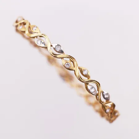 Armring med klare stener to-farget, Ø 58,1 mm, bredde 5,8 mm, skjev, skadet, 21K Vekt: 10,1 g Kontakt Lånekontoret for frakt