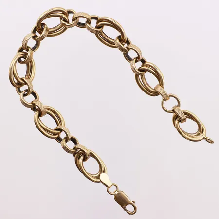 Armbånd, lengde 21 cm, bredde 11,4 mm, 18K Vekt: 13,6 g Kontakt Lånekontoret for frakt