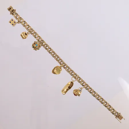 Armbånd i bismark med 6 charms, 14K. Vekt: 22,3 g Kontakt Lånekontoret for frakt