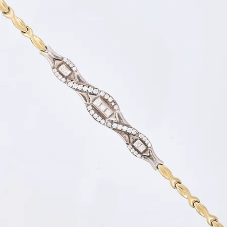 Armbånd med klare stener, lengde 20cm, bredde 3-13mm, 14K, mangler 1 sten Vekt: 13,7 g Kontakt Lånekontoret for frakt