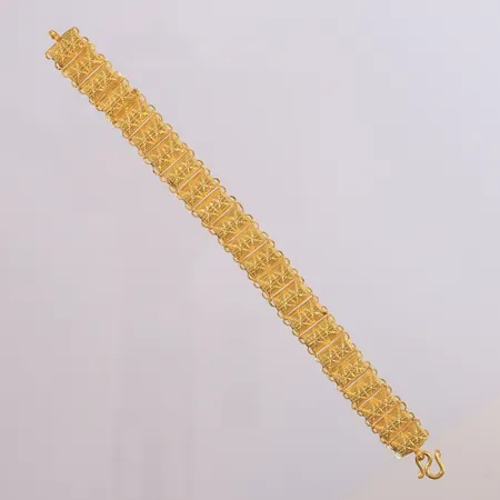 Armbånd thai-gull, bredde 11,8 mm, 16 cm, 23K. Vekt: 7,5 g Kontakt Lånekontoret for frakt