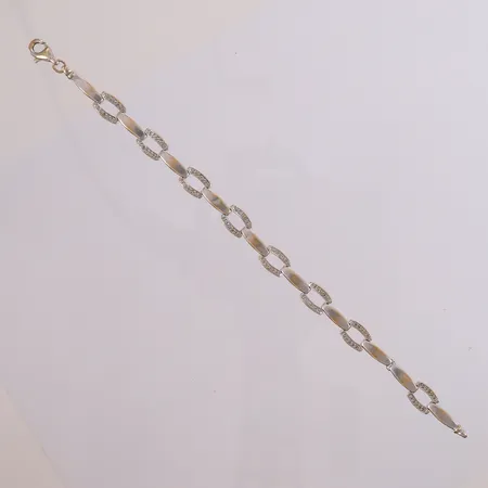 Armbånd med klare stener, 18K. Vekt: 10,7 g Kontakt Lånekontoret for frakt