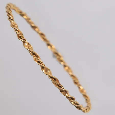 Armring, ca ø64mm, bredde ca 2mm, utemplet, 18K gull. Vekt: 9,6 g Kontakt Lånekontoret for frakt