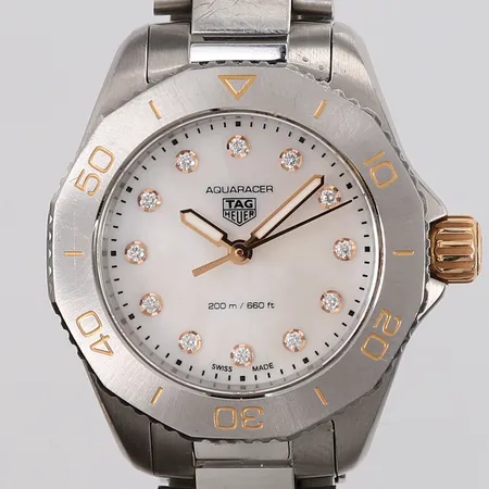 Dameur Tag Heuer Aquaracer, ref WBP1450.BA0622, snr BRL5012, ø30mm, quartz, stål, perlemorurskive med diamanter, digital sertifikat, boks og eske. Vekt: 0 g Kontakt Lånekontoret for frakt