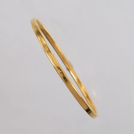 Armring, ø65mm, bredde ca 3mm, 18K gull. Vekt: 4,4 g Kontakt Lånekontoret for frakt