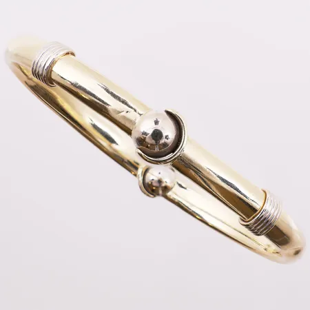 Armring to-farget, Ø ca 62 mm, bredde 6 - 9,9 mm, bulket, 14K Vekt: 15 g Kontakt Lånekontoret for frakt