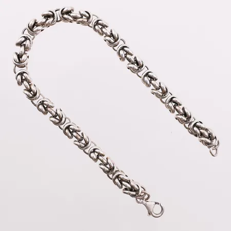 Armbånd kongemønster, lengde 24 cm, bredde 7 mm, 925S Vekt: 20,9 g Kontakt Lånekontoret for frakt