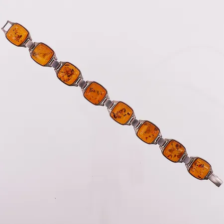 Armbånd med oransje stener, lengde 19 cm, bredde 14,3 mm, 925S Vekt: 25,6 g Kontakt Lånekontoret for frakt