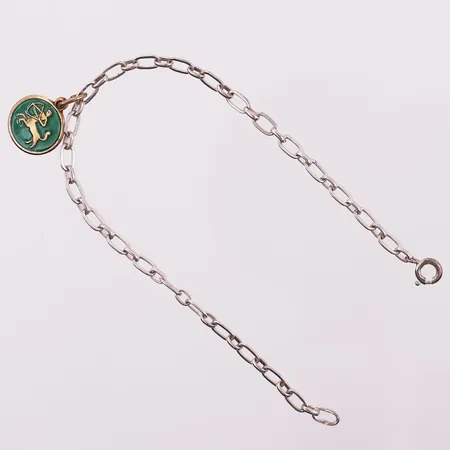 Armbånd med grønt emaljert anheng skytten, lengde 19,5 cm, bredde 3,7 mm, David-Andersen, 925S Vekt: 4,7 g Kontakt Lånekontoret for frakt