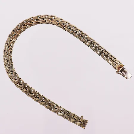 Armbånd, Ø ca 68 mm, bredde 6,6 mm, defekt lås, 14K Vekt: 24,3 g Kontakt Lånekontoret for frakt