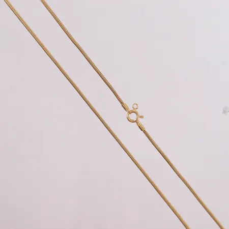 Halskjede med italienske stempler, lengde ca 44cm, bredde ca 1,5mm, noe ujevnt mønster, låsen er ikke festet, 14K gull. Vekt: 6,7 g Kontakt Lånekontoret for frakt