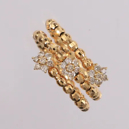 Ring med diamanter (21 x ca. 0,01ct), ø16,5mm, bredde 4,7- 14mm, 18K Vekt: 2,3 g Kontakt Lånekontoret for frakt