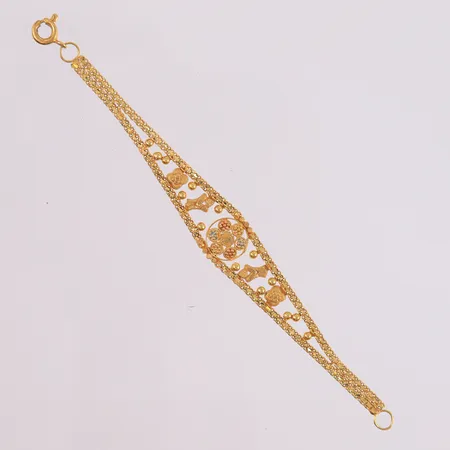 Armbånd for barn, lengde 11,8mm (OBS! Liten størrelse), bredde 3,6- 11,9mm, 18K Vekt: 3,8 g Kontakt Lånekontoret for frakt