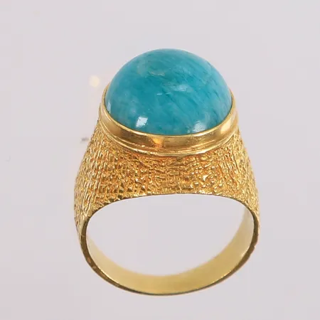 Ring med turkis sten (muligens Turkos), ø15mm, bredde 3,4- 16,8mm, ustemplet, 18K, bruttovekt 6,8g Vekt: 0 g Kontakt Lånekontoret for frakt