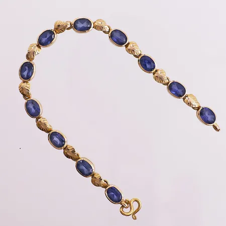 Armbånd med blå stener, lengde 16 cm, bredde 6,2 mm, 18K Vekt: 12,3 g Kontakt Lånekontoret for frakt