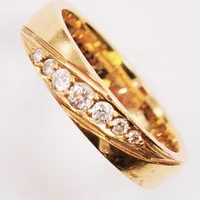 Ring, diamanter 0,20ctv enligt gravyr, Ø17¾, bredd:4m, tunn gravyr, 18K 6,2g.