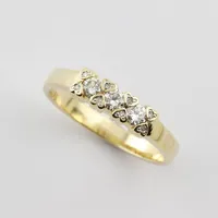Ring med diamanter totalt enligt gravyr 0,29ct, stl 18½mm, bredd 2,7-4,5 mm, 18K Vikt: 4,8 g