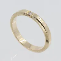 Ring med diamant 0,03ct, stl ca 17mm, bredd 2,9mm, 14K Vikt: 3,3 g