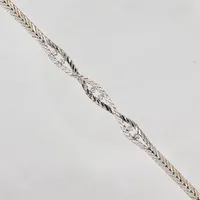 Armband, diamanter ca 0,24ctv enligt gravyr, 19,5cm, bredd 5-8mm, nagg på en diamant, vitguld, 18K Vikt: 19 g