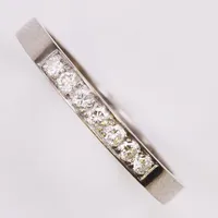 Ring, briljantslipade diamanter 7x ca 0,03ct, Ø19¼, bredd: 3mm, gravyr, vitguld, 18K Vikt: 3,7 g