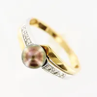 Ring, diamanter 6 x ca 0,01ct, odlad saltvattenspärla Ø5,5mm, bruntonad, stl 16½, vitguld/gulguld, 18K. Vikt: 2,1 g