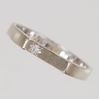 Ring stl 19½, diamant 1x 0,02ct enligt gravyr, bredd 2,9mm, gravyr, vitguld, 18K Vikt: 3,8 g