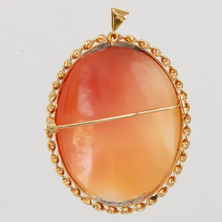 Brosch/hänge, kamè av snidat snäckskal, 50x36mm, 18K bruttovikt: 14,5g.