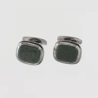 Ett par manschettknappar med gröna stenar, stämplat Rusch, ca 21x17mm, silver 835/1000 Vikt: 13,6 g
