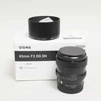 Objektiv Sigma 65mm, F2 DG DN, Ø62, serienr 55255416, manual, kartong. Vikt: 0 g