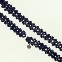 Collier, svarta plastpärlor, ca 120cm, bredd 2cm, silverdetalj märkt annika 925 Vikt: 0 g